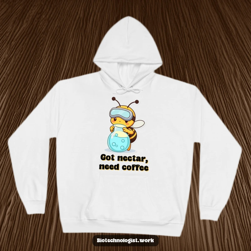 Funny, warm hoodie depicting a busy bee in goggles tending to a science beaker, offering comfort and a humorous touch.